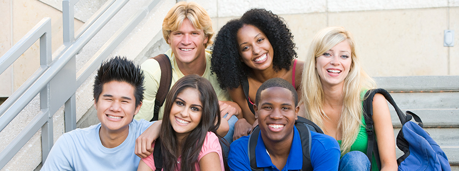 Six young adults smiling